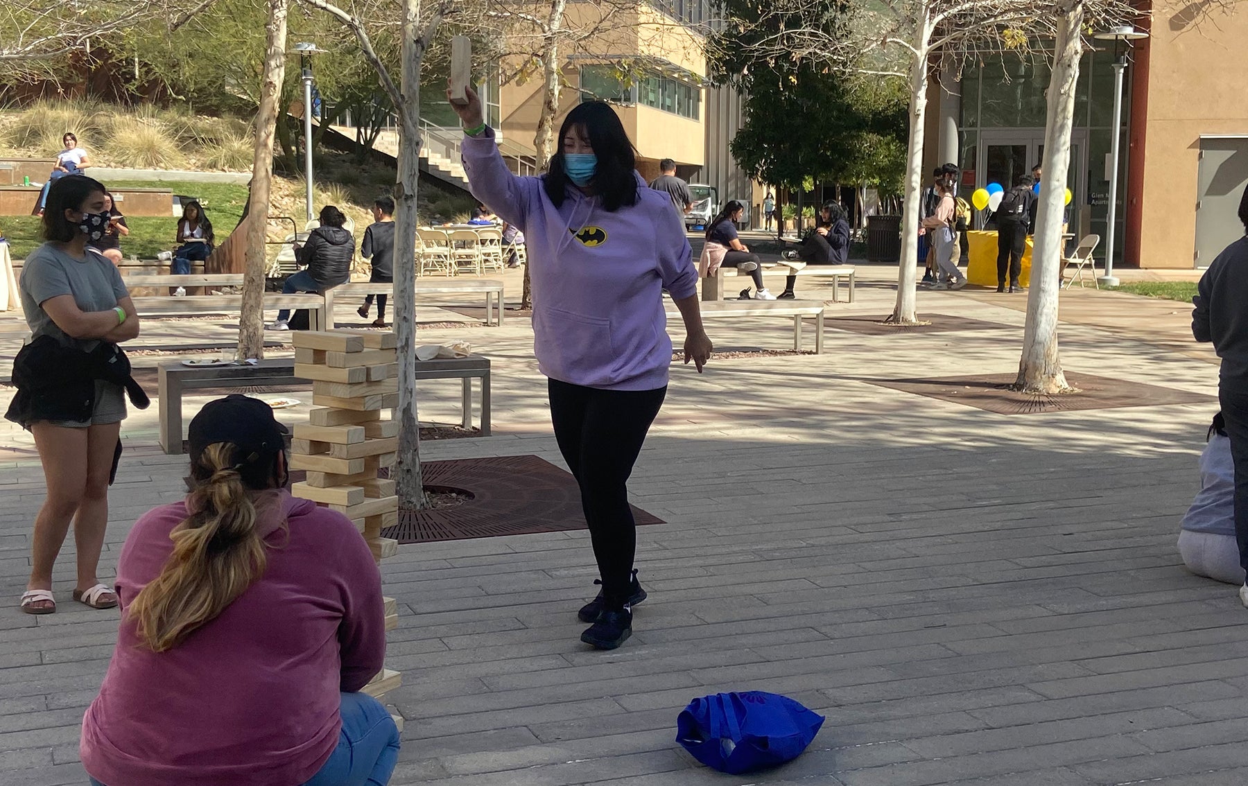 students playing large jenga