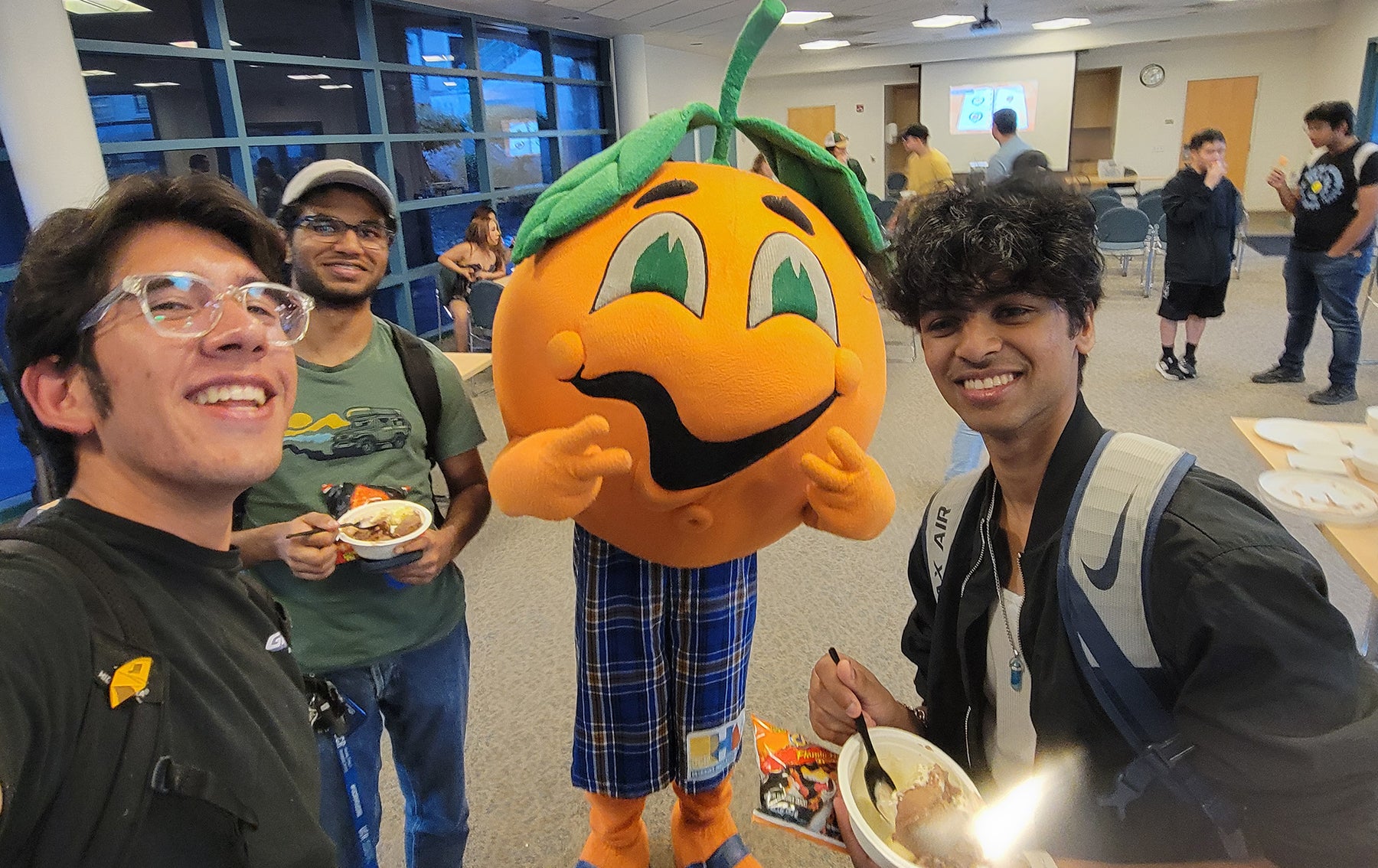 Students with Norm the Navel mascot