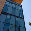 Exterior of Dundee Residence Hall from a low angle looking up.