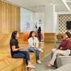 Students in the common area at Dundee Residence Hall.