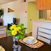 Interior of an apartment at the Plaza showing living and dining room.