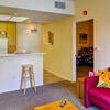 Living room and kitchen area in the Stonehaven Campus Apartments.