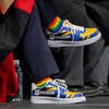 CHASS dean wearing colorful UCR-themed shoes