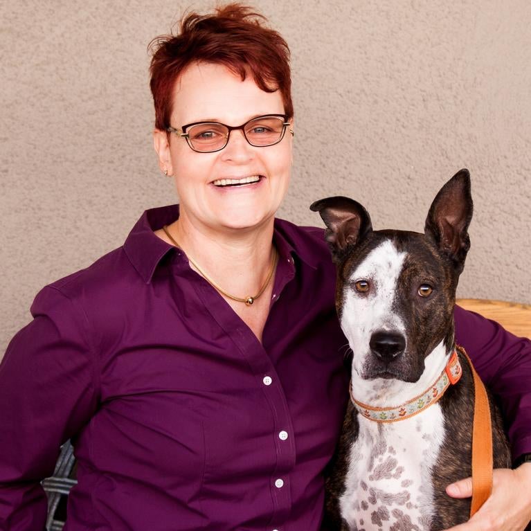 Katja M. Guenther with her dog, Monkey