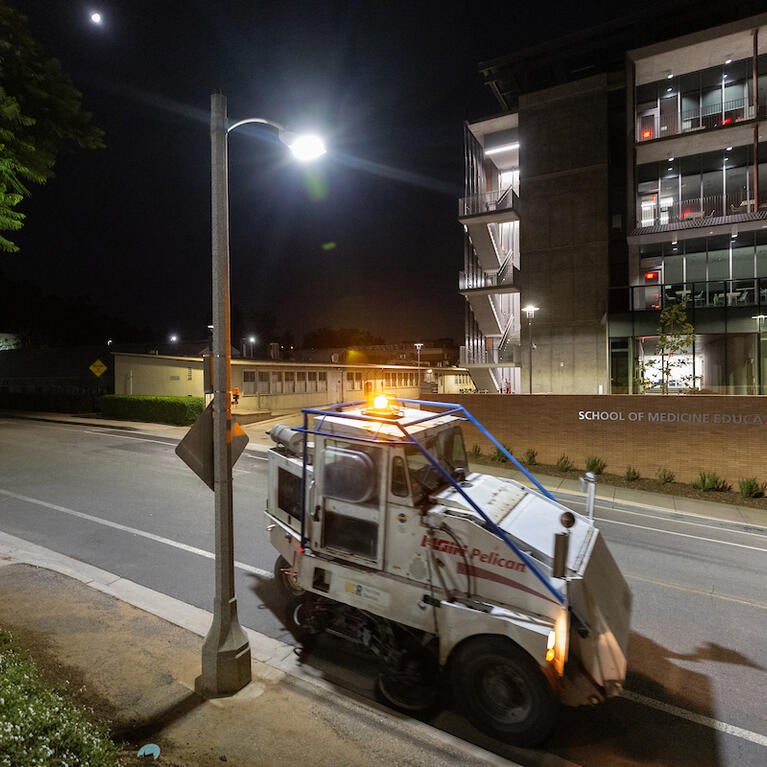 Street sweeper at night