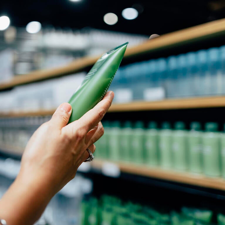 Hand holding a beauty product