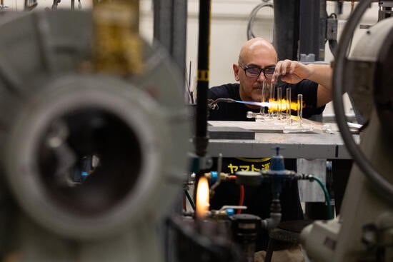 Stephen Lepore works on a Schlenk line