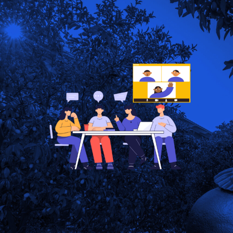 community members raise hands during hybrid meeting in conference room