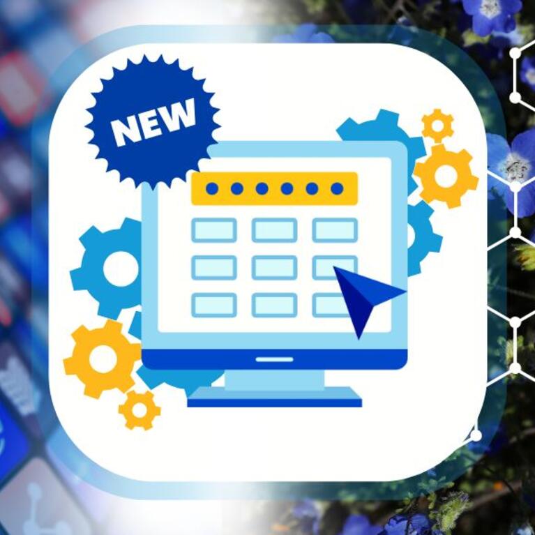 Computer monitor with cursor showing surrounded by cogwheels and a round icon with the word new at the top