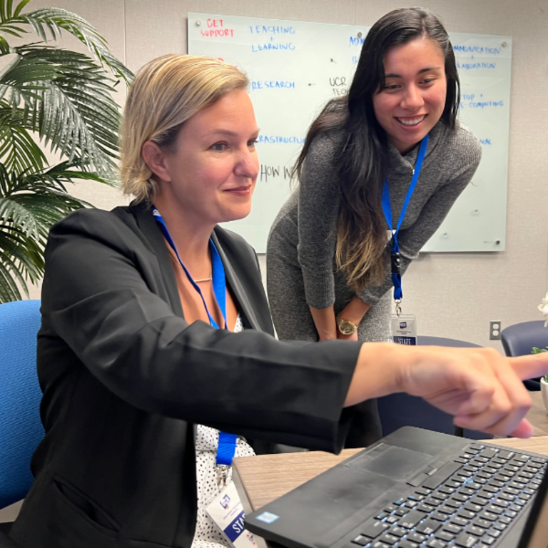 ITS manager points at screen