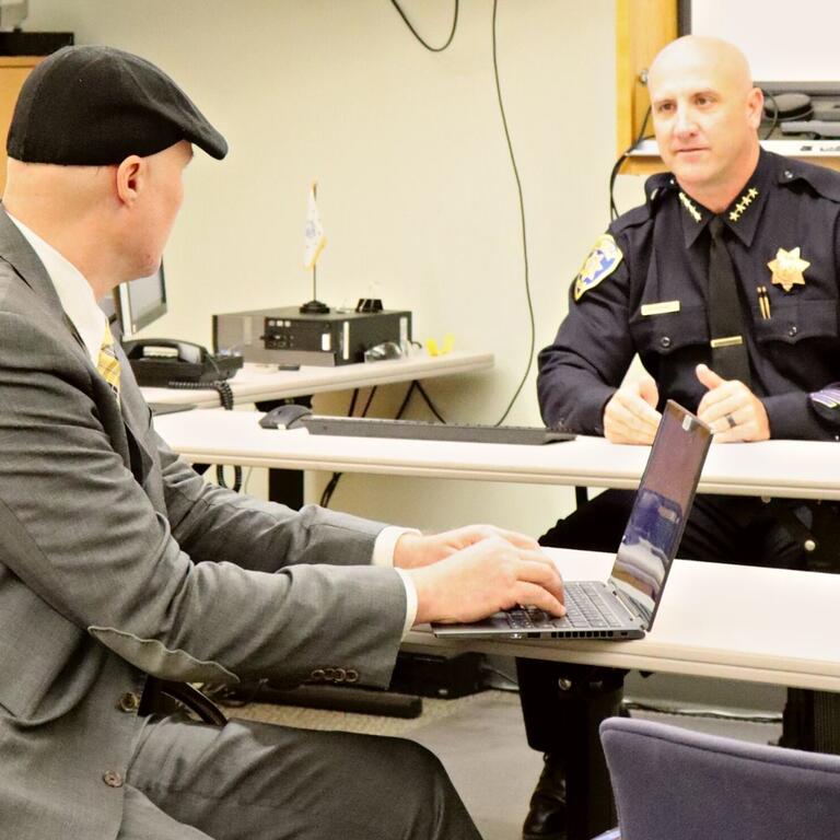 Chief of police speaks to Chief Information Security Officer