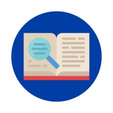 A magnifying glass looking over text in a book