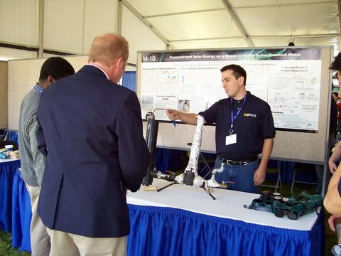      Left photo: Team presenting to judges in Washington, D.C., April 2010.