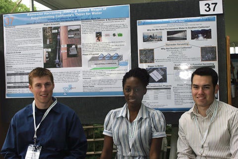 In photo: Roland Cusick, Temi Ogunyoku, and Greg Guillen at the National Design Expo in Washington, D.C. Not in photo: Andrew Chin, Steven Gebelin and advisors Mark Matsumoto and Kawai Tam