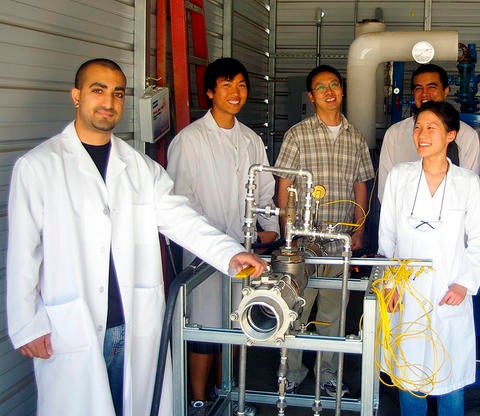 Right photo: Anthony Turgman, Vu Nguyen, Jian Shi (post-doc), Josh Garong and Christine Kwon. Not in photo: Advisors Charles Wyman and Kawai Tam; original member: Bin Yang. 