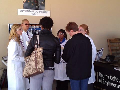 In right photo: Sustain-a-drain presents to the Intel judges.