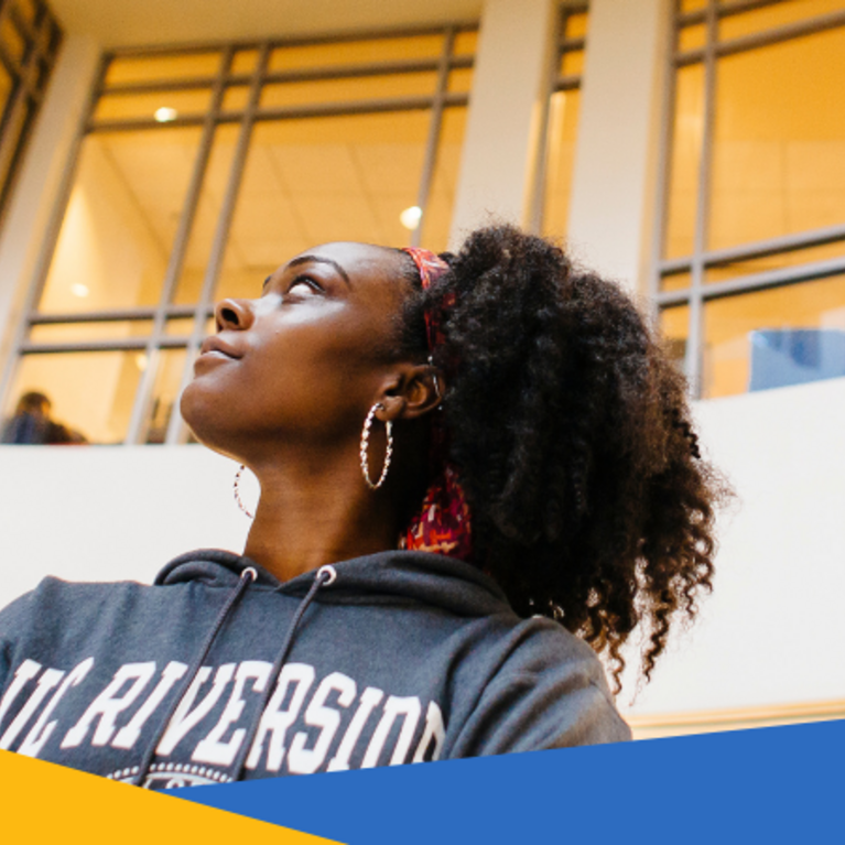 Image of a student looking up in the Orbach Library.