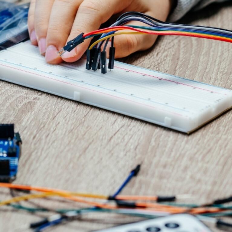 person working with sensors