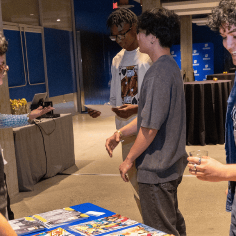 Phoenix Alexander and student at UCR Alumni event
