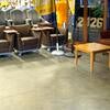 Low-profile rolling chairs with and without attached tabletops
