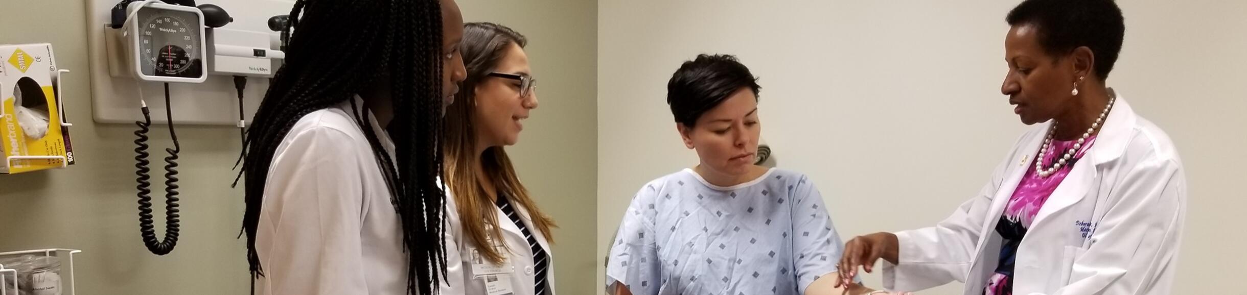 Deas working with students