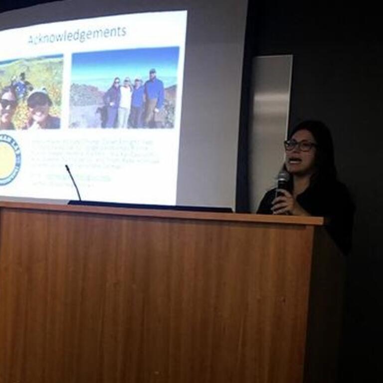 Speaker presenting on HDR research in Education 1