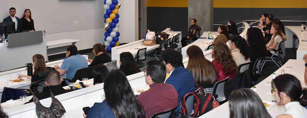 LMSA conference attendees sitting in a room