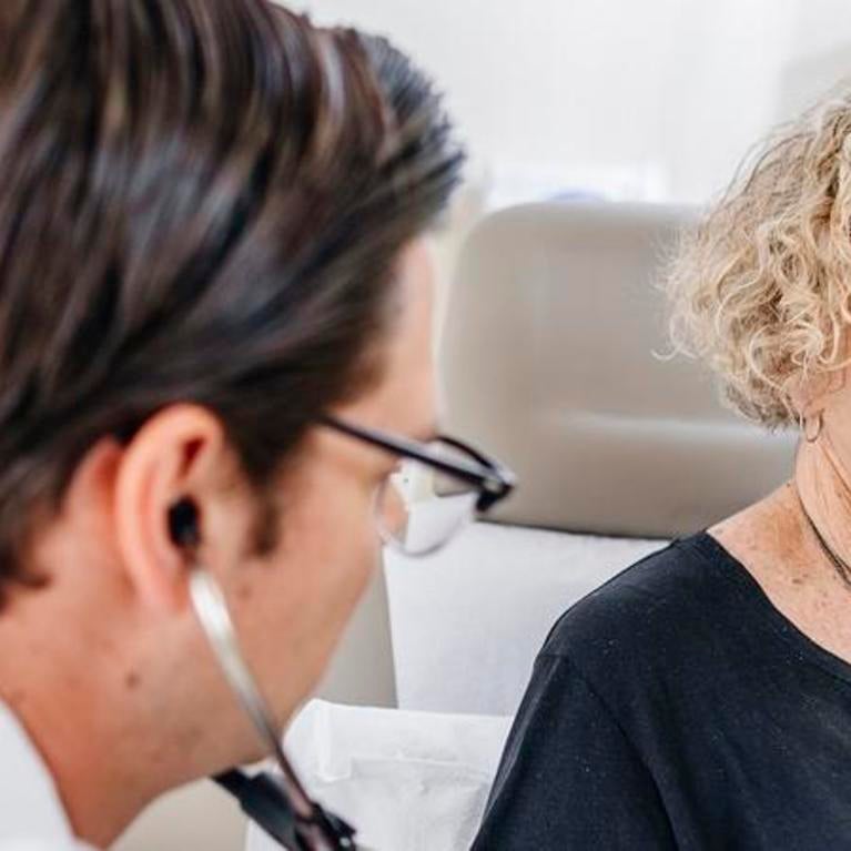 Resident with a patient