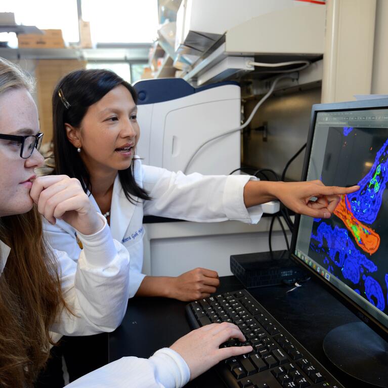 Dr. Nair with a student