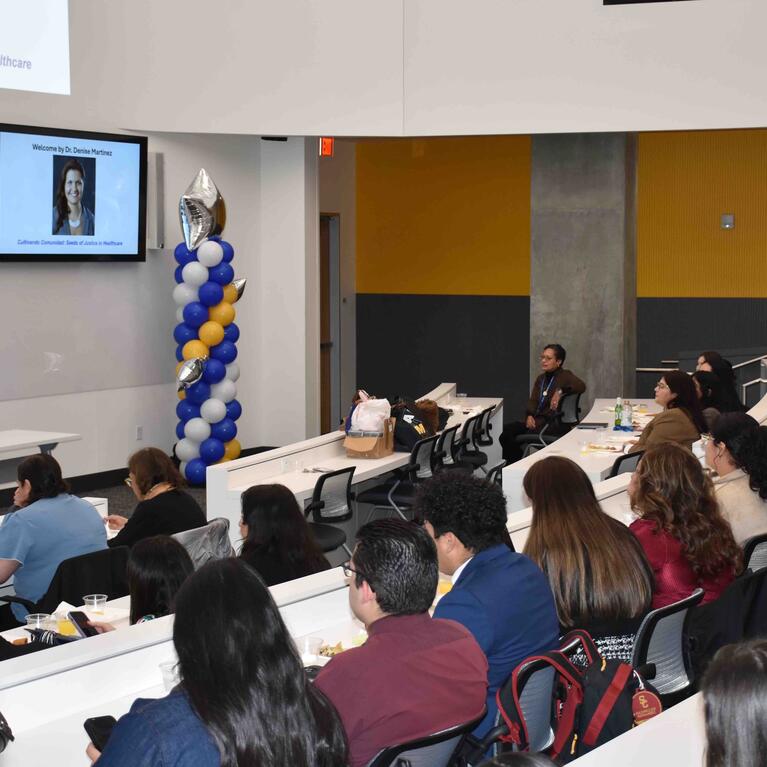LMSA conference attendees sitting in a room