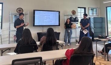 Students watching a presentation