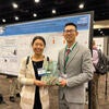 5/23/2022 Bosen Jin, Student Paper Winner at the Battelle Chlorinated Conference 2022, in front of Yaochun Yu's poster from M.E.N. group. 