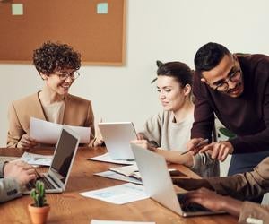group of people sitting at a table