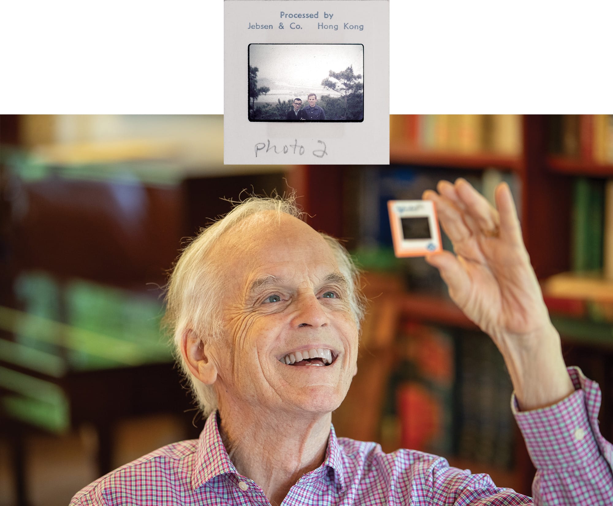 Link looks at an old photo slide of himself