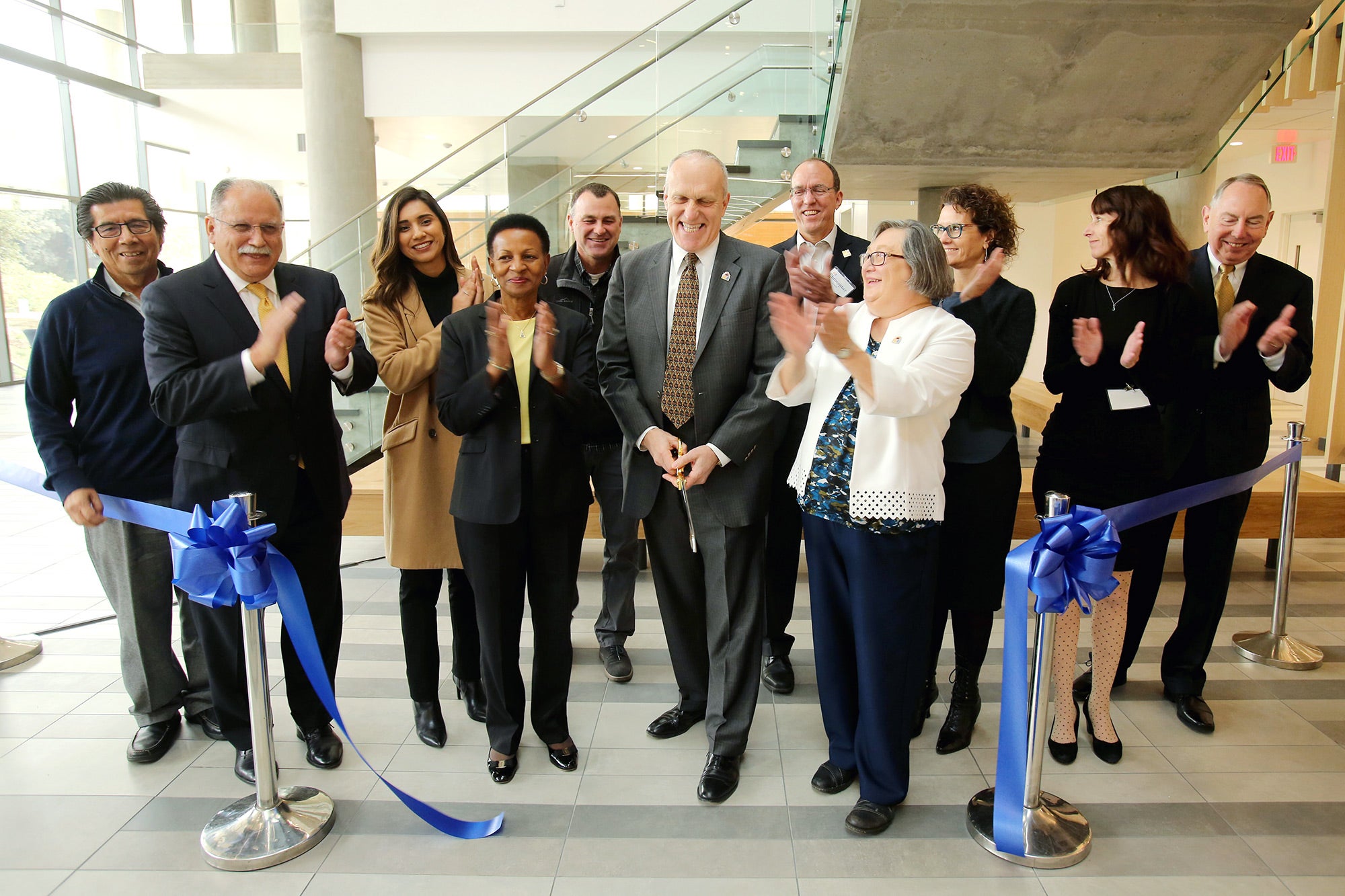 Wilcox and campus leaders at a dedication for the Multidisciplinary Research Building in December 2018.