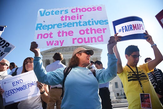 Protestor demonstrate against gerrymandering outside US Supreme Court in 2017