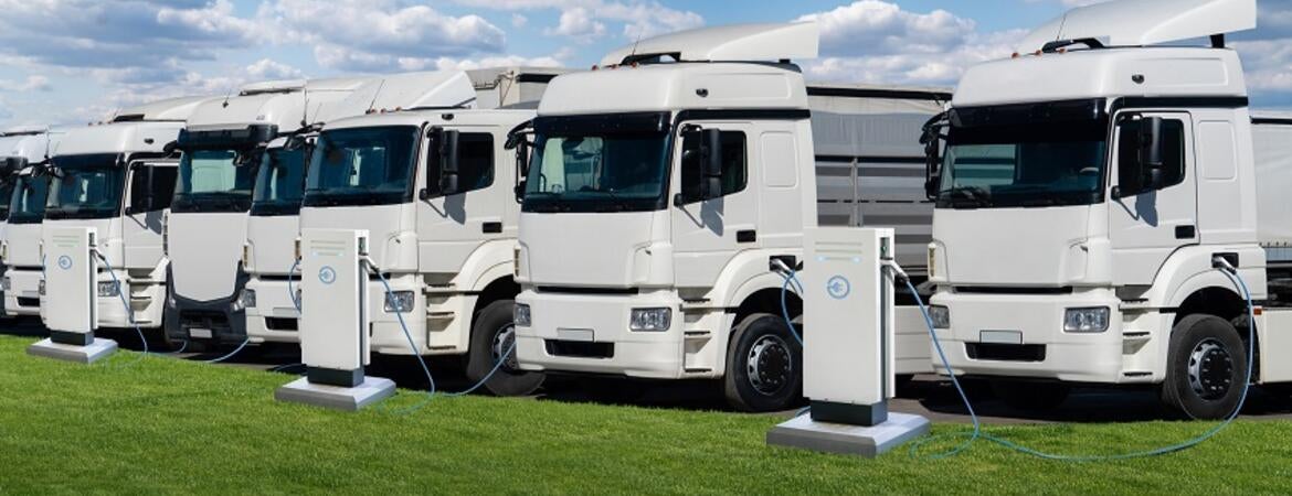 EV trucks at charging stations