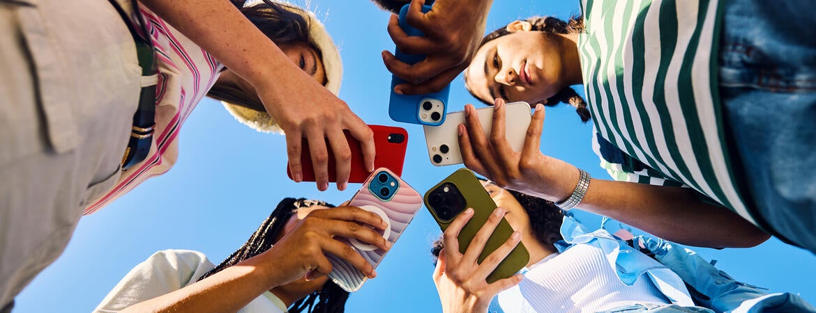 Teens on cellphone accessing social media