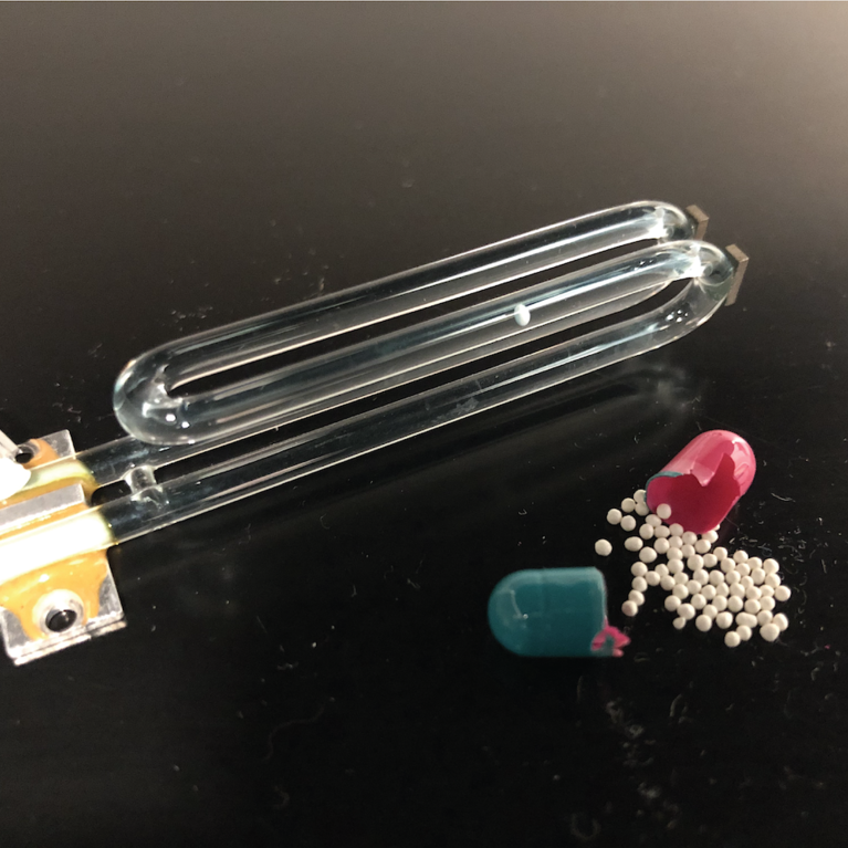 A piece of glass tubing bend like a tuning fork is used to measure dissolution of time release drugs