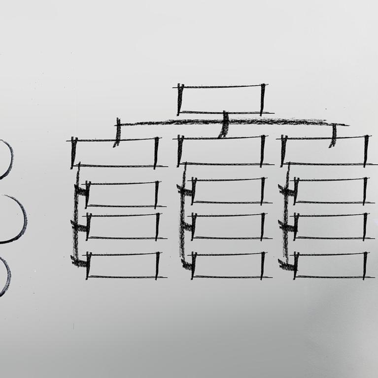 a businesswoman writing on a whiteboard