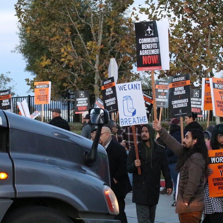 A coalition of labor unions and community-based organizations protest a new Amazon air cargo distribution center in San Bernardino, where air pollution and rates of asthma rank among worst in the nation, 2019. Photo: Courtesy of Anthony Victoria, The Frontline Observer.