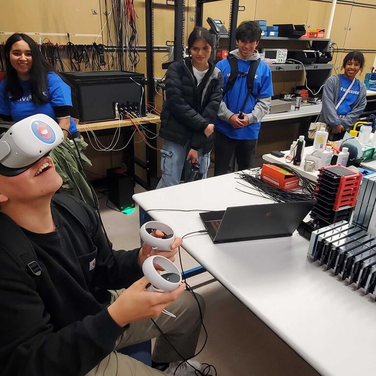 A young student uses virtual reality