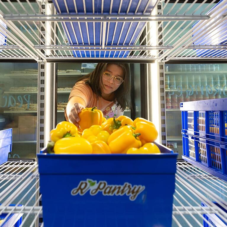 UCR student working at R'Pantry