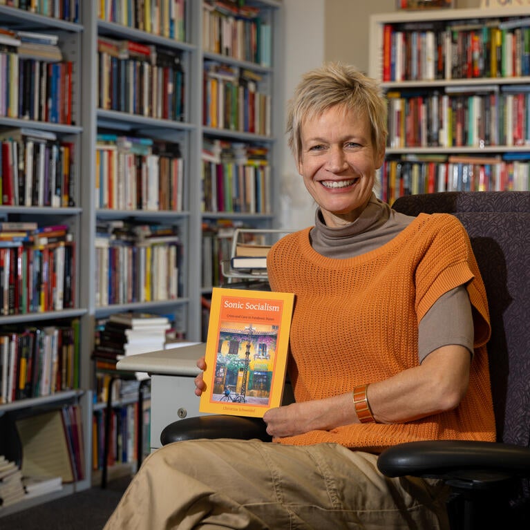 Christina Schwenkel with her book