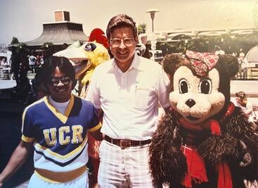Hullar on the UCR campus with a student and mascot