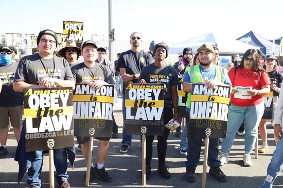 Workers and supporters strike outside the Amazon KSBD Air Hub in San Bernardino.