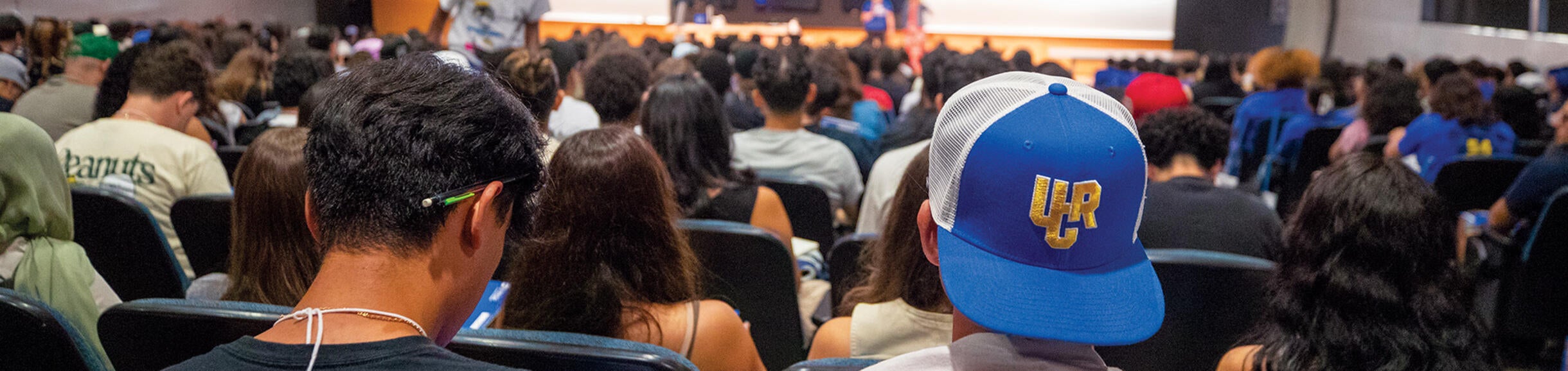 Highlander Orientation session in auditorium setting