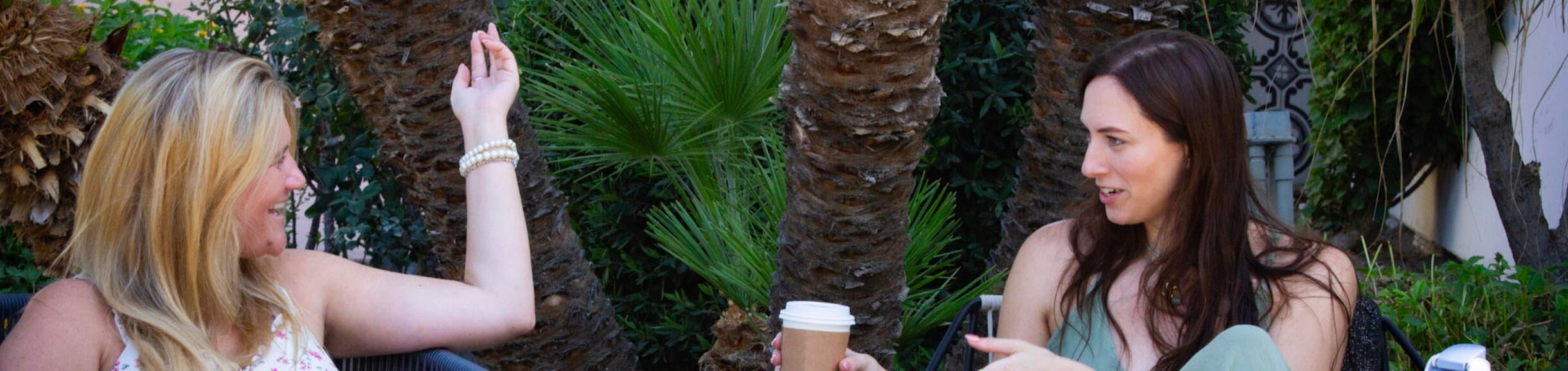 Low-Residency MFA students chatting at the Tommy Bahama Miramonte Resort