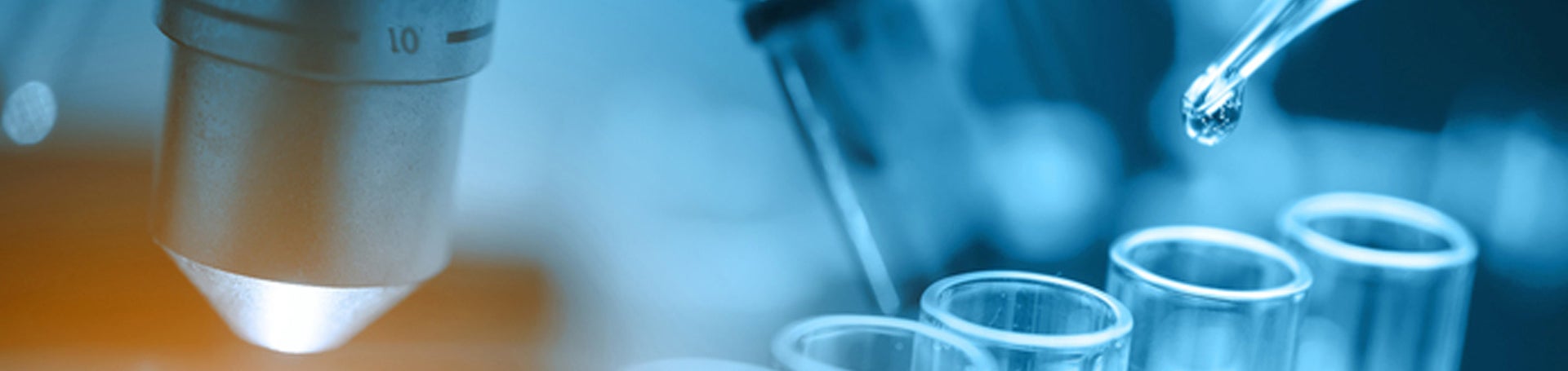 microscope with lab glassware (c) istock