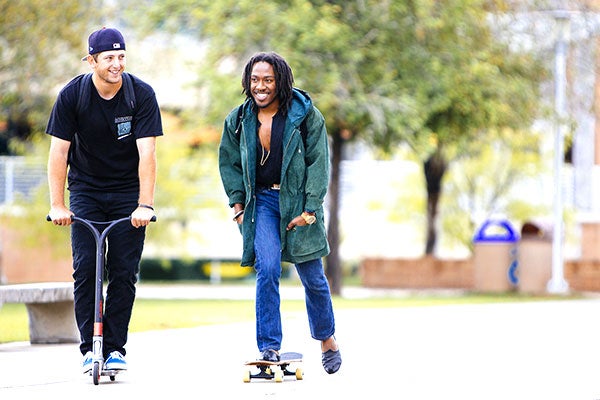 A roomy Point-to-Point Shuttle Service van that is used to transport students to and from the campus and their off-campus home.